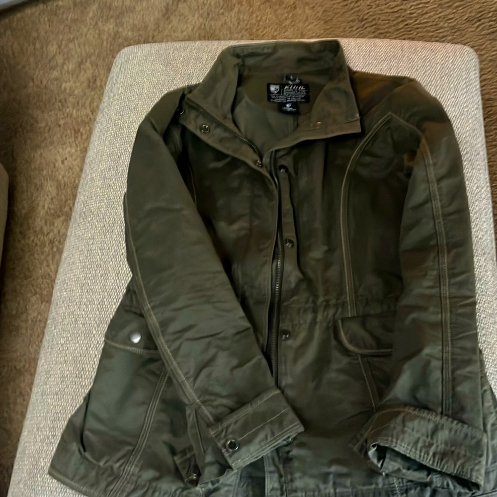 Kuhl brand lightweight, zippered, and snap jacket. Great lightweight jacket.